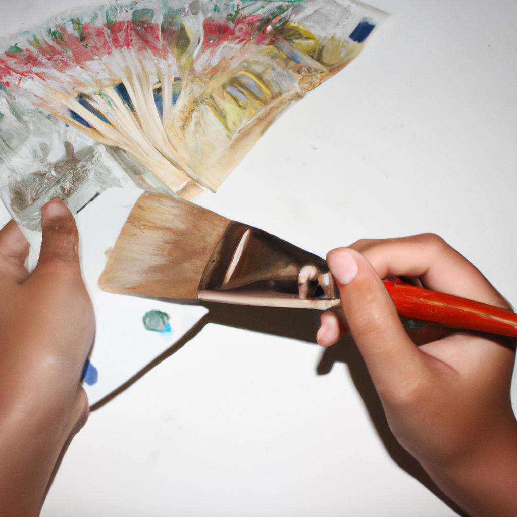 Person holding paintbrush, counting money